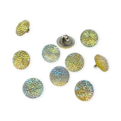 Botões redondos com cristais brilhantes em tons dourados e iridescentes