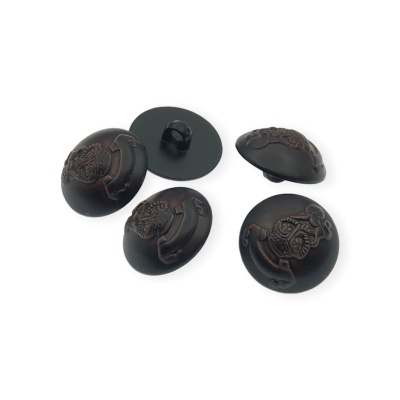 Botões pretos redondos com relevos decorativos castanhos
