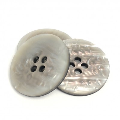 Três botões cinza perolados com textura marmoreada