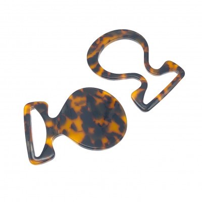 Acessórios em padrão tartaruga castanho e preto em plástico brilhante