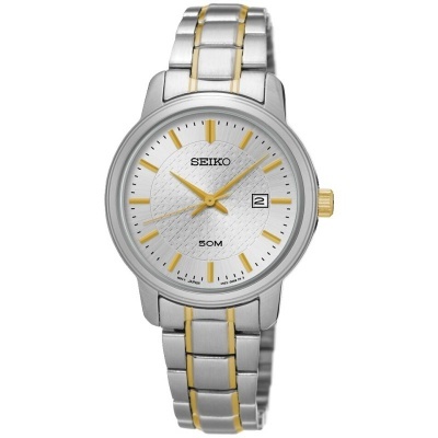 Relógio Seiko prateado com detalhes dourados e indicação de data