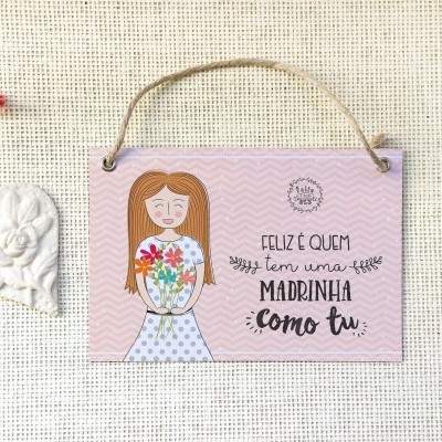 Placa decorativa rosa com texto e ilustração de mulher a segurar flores