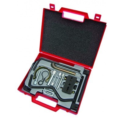 Estojo vermelho aberto com ferramentas metálicas organizadas no interior moldado em plástico cinza.