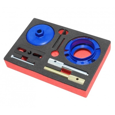 Conjunto de ferramentas com peças metálicas e plásticas azul em suporte de espuma preta e vermelha