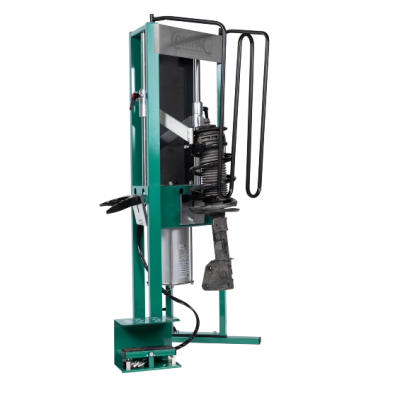 Máquina industrial metálica verde e preta com painel escrito DYNATRAC