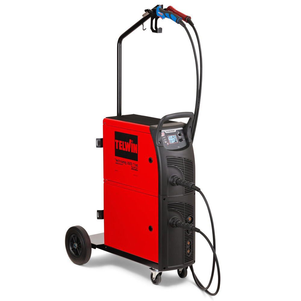 Máquina de soldar Technomig 223 Treo Synergic Máquina de soldar vermelha e preta com rodas e cabos