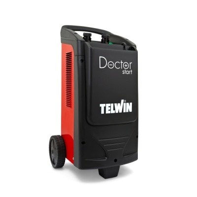 Equipamento móvel preto e vermelho para arranques com rodas e inscrições Doctor start e TELWIN