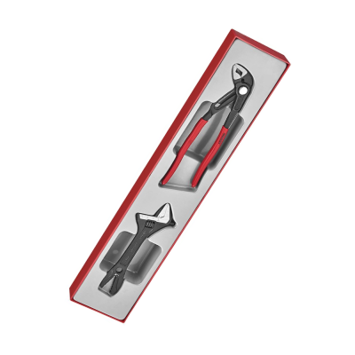 Conjunto de alicate e chave inglesa em caixa vermelha