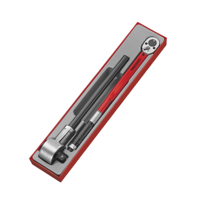 Chave dinamométrica vermelha e preta numa caixa de plástico cinzenta com bordas vermelhas