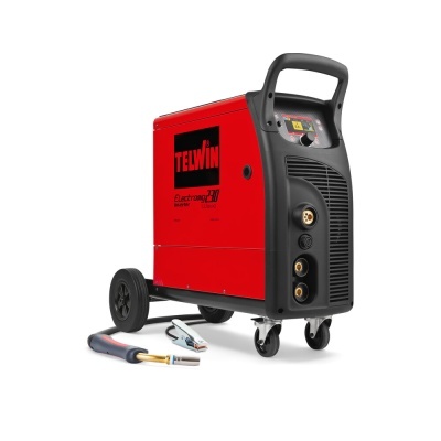 Soldador TELWIN vermelho e preto com rodas e acessórios no chão