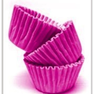 Formas de papel para cupcake cor de rosa empilhadas