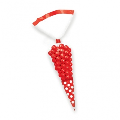 Saco plástico em forma de cone com bolas vermelhas e padrão de bolinhas brancas.