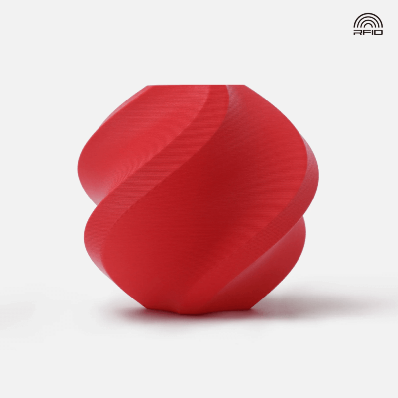 Vaso decorativo vermelho com padrão em espiral