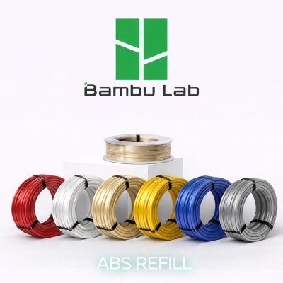 Carretéis coloridos de filamento ABS para impressão 3D com o logotipo Bambu Lab.