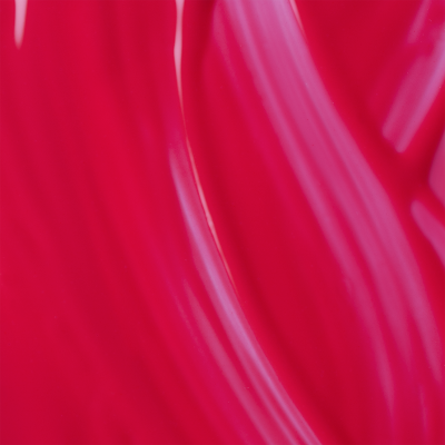 Superfície lisa e brilhante de verniz rosa vibrante.