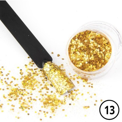 Pote de glitter dourado com bolsa preta contendo glitter na ponta