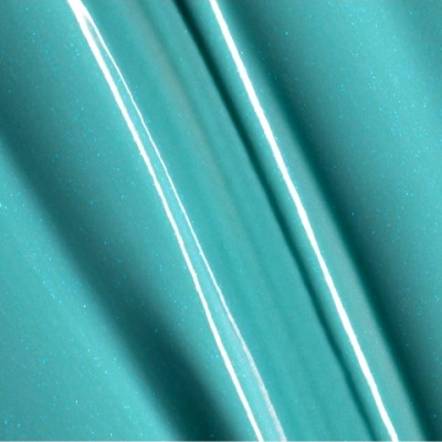 Tecido ou material azul turquesa com brilho e reflexos de luz