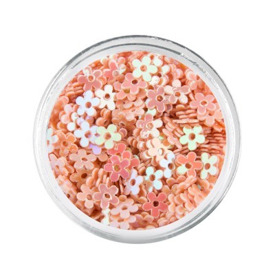 Lantejoulas em forma de flor coloridas dentro de frasco transparente