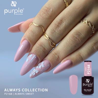 Unhas postiças rosa suave com verniz gel Purple Professional e decoração branca, mão feminina com anéis dourados