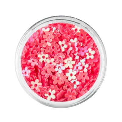 Frasco com pequenos flocos florais coloridos