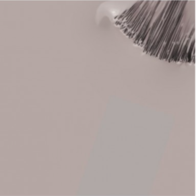 Pincel de maquilhagem com cerdas castanho claro e escuro sobre superfície bege