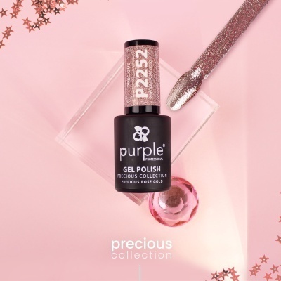 Esmalte em gel Precious Rose Gold da Purple Professional sobre fundo rosa e decoração com estrelas