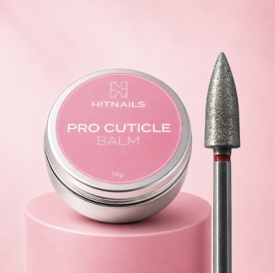 Tampa rosa de embalagem redonda de Pro Cuticle Balm, ao lado broca metálica pontiaguda