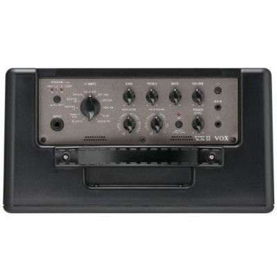 Amplificador de guitarra VOX preto com painel frontal cinza e botões pretos