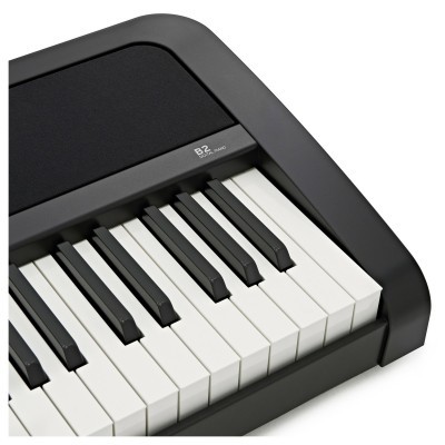 Teclado musical preto com teclas brancas e pretas e texto B2 STAGE PIANO
