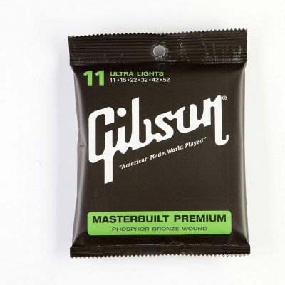 Pacote preto de cordas para guitarra Gibson com texto branco e verde