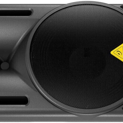 Coluna de som profissional Behringer preta com grelha metálica circular e logótipo amarelo