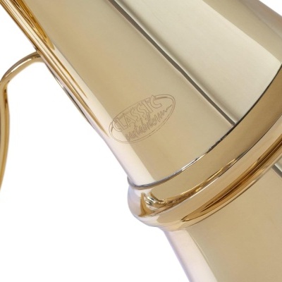 Instrumento musical dourado com gravação LATIN AMERICAN