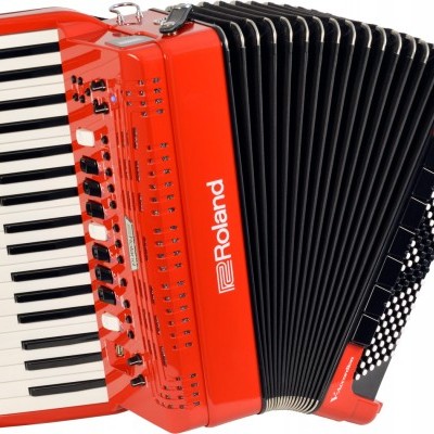 Acordeão vermelho e preto da marca Roland com teclas e botões