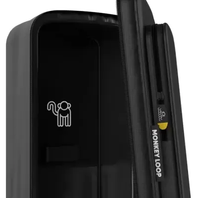 Mala de viagem rígida preta aberta com etiqueta MONKEY LOOP e ícone de macaco interior