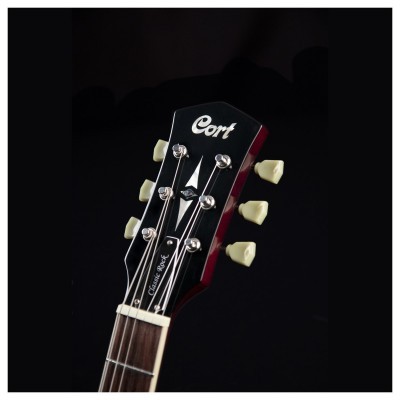 Cabeça de guitarra elétrica preta da marca Cort com cravelhas brancas