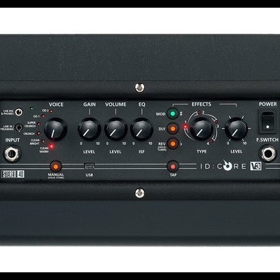 Amplificador de guitarra preto com painel de controlo frontal e botões