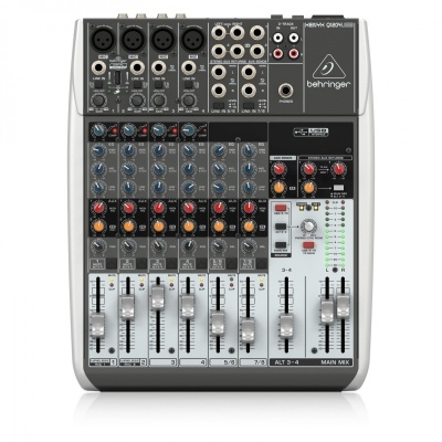 Mesa de mistura Behringer XENYX Q1202USB com múltiplos canais e controlos coloridos
