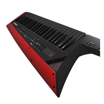 Teclado musical eletrônico preto e vermelho com visor digital