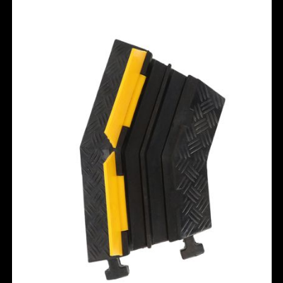 Peça modular de borracha preta com inserções amarelas para pavimento