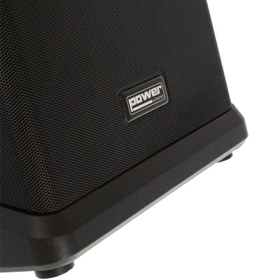 Coluna de som preta com grelha metálica e etiqueta Power Acoustics.