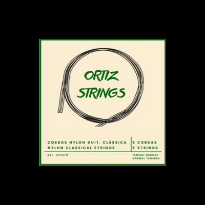 Embalagem de cordas de guitarra clássica Ortiz Strings com texto em verde e fundo bege