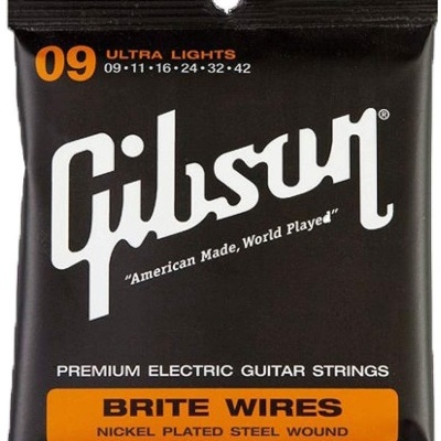Embalagem preta com cordas para guitarra elétrica Gibson