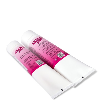 Dois tubos de colas epóxi AKEROX 2010 com rótulos rosa