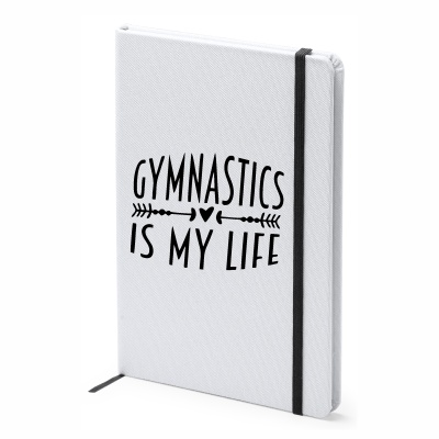 Caderno branco com texto 'GYMNASTICS IS MY LIFE'