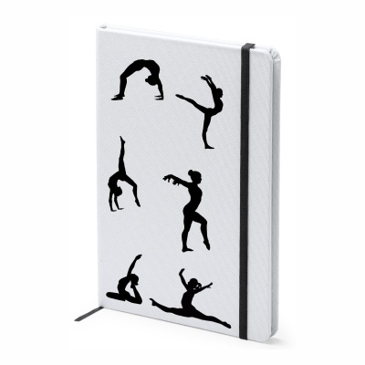 Caderno branco com elástico preto e silhuetas pretas de bailarinas