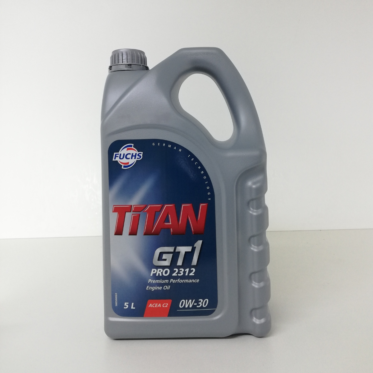 Recipiente cinzento de óleo de motor com rótulo azul e vermelho