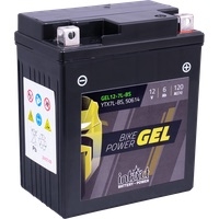 Bateria para moto preta com rótulo BIKE POWER GEL e sinais de aviso coloridos