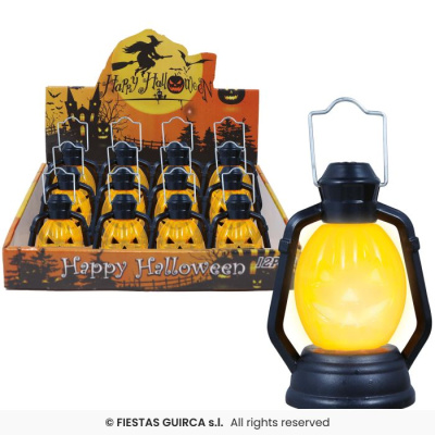 Lanternas de Halloween amarelas com base preta e rosto de abóbora iluminado em caixa decorativa