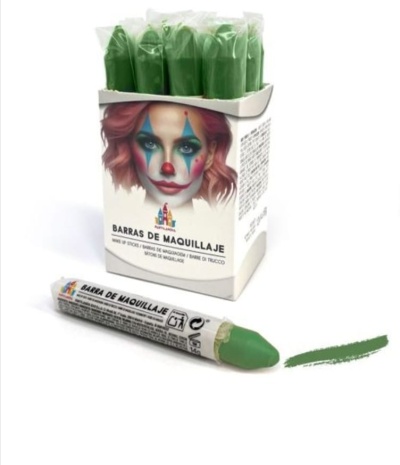 Barras de maquilhagem verdes em embalagem com rosto pintado de palhaço