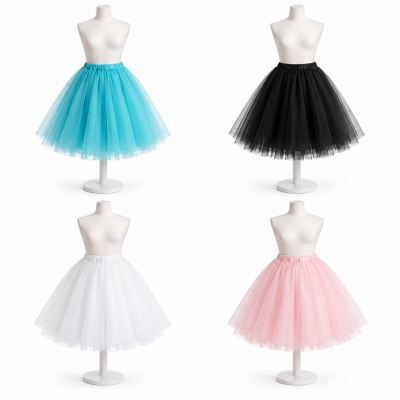 Quatro saias de tule em diferentes cores exibidas em manequins